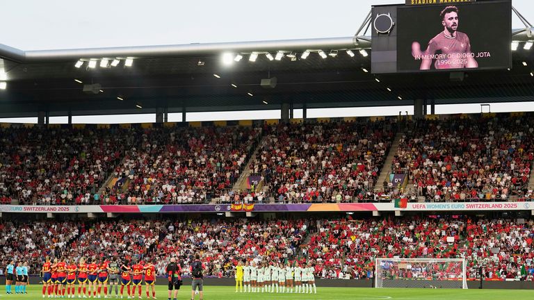 Players of the two teams observe a minute's silence in memory of Liverpool and Portugal forward Diogo Jota before the Euro 2025, group B, soccer match between Spain and Portugal at Stadion Wankdorf in Bern, Switzerland, Thursday, July 3, 2025. (AP Photo/Martin Meissner)