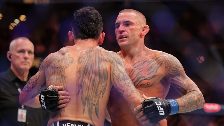 Holloway defeated Dustin Poirier (left) in a unanimous decision to retain the UFC BMF Championship in UFC 318 at the Smoothie King Center.
