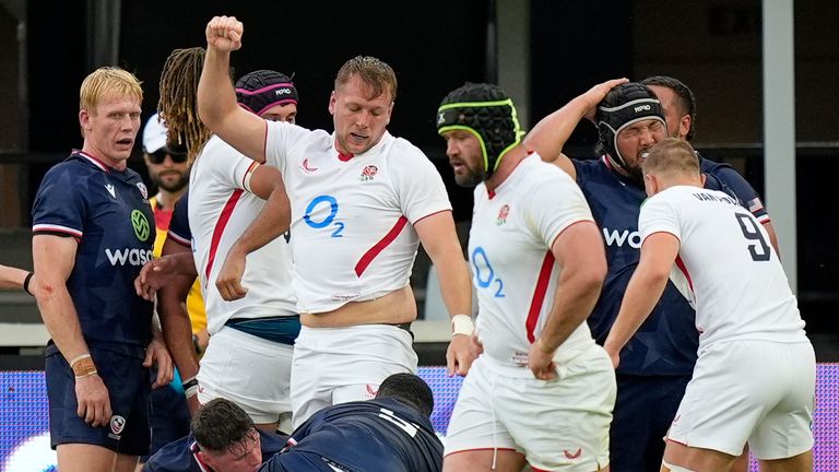 England players celebrate after scoring a try during the men's rugby union international between England and the USA at Audi Field in Washington, Saturday, July 19, 2025. (AP Photo/Alex Brandon)