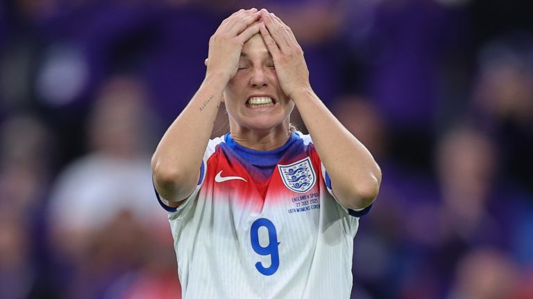 Beth Mead reacts after seeing her penalty saved