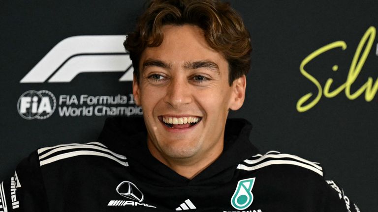 Mercedes' British driver George Russell smiles during a press conference ahead of the Formula One British Grand Prix at the Silverstone motor racing circuit in Silverstone, central England, on July 3, 2025. (Photo by Ben STANSALL / AFP)