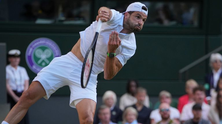 Grigor Dimitrov in action against Jannik Sinner at Wimbledon 2025