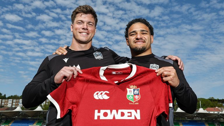 Glasgow, Scotland - May 08: Huw Jones (L) by Glasgow Warriors and Sione Tuipulotu are illustrated after being called for the British and Irish Lions team, at the Scotstoun stadium, on May 08, 2025, in Glasgow, in Scotland. (Photo by Ross Macdonald / SNS Group)