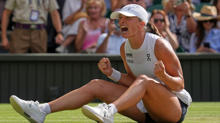 Poland's Iga Swiatek celebrates after beating Amanda Anisimova of the U.S. to win the women's singles final at the Wimbledon Tennis Championships in London, Saturday, July 12, 2025. (AP Photo/Kin Cheung)