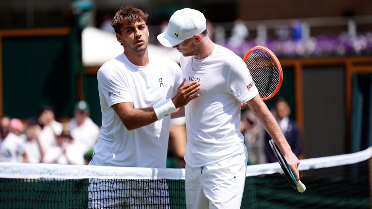 Jack Pinington Jones (right) after his defeat against Flavio Copoli on the fourth day of Wimbledon 2025 in all England