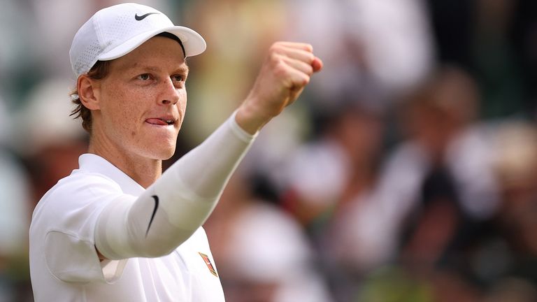 Italy's Jannik Sinner celebrates after winning against  US player Ben Shelton during their men's singles quarter-final tennis match on the tenth day of the 2025 Wimbledon Championships at The All England Lawn Tennis and Croquet Club in Wimbledon, southwest London, on July 9, 2025. (Photo by HENRY NICHOLLS / AFP) / RESTRICTED TO EDITORIAL USE