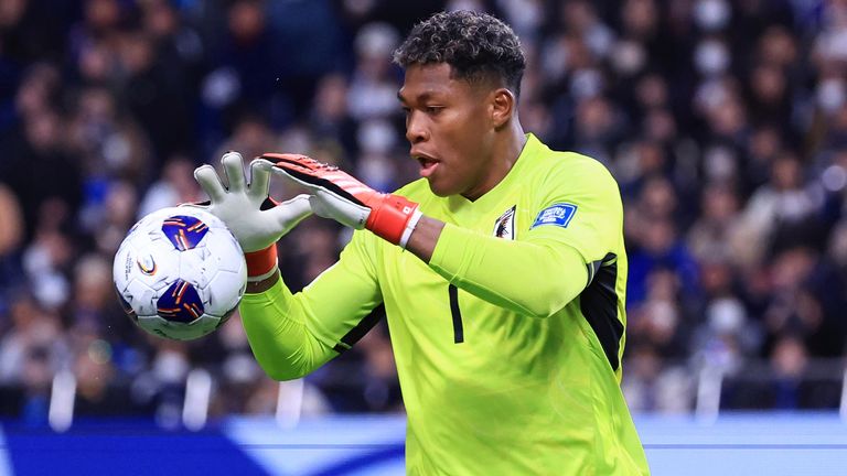 Japan's Zion Suzuki catches the ball in the second half of 2026 North and Central America World Cup Asian Final Qualifiers against Bahrain