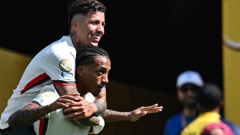 Joao Pedro celebrates his second goal against Fluminense with Chelsea team-mate Enzo