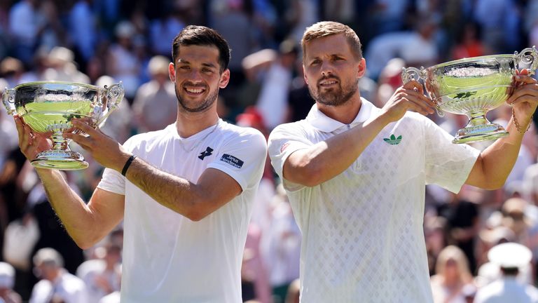 Julian Cash (left) and Lloyd Glasspool became the first all-British pair to win at Wimbledon since 1936
