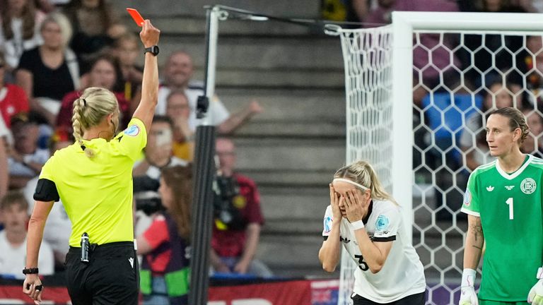 Germany's Kathrin Hendrich is shown a red card