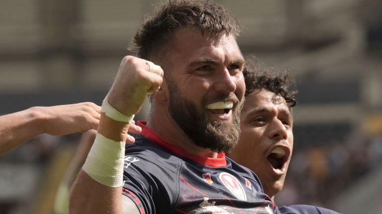 St Helens' Kyle Feldt celebrates scoring a try against Hull FC