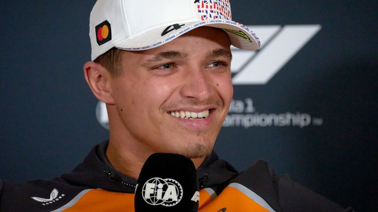 McLaren driver Lando Norris of Britain smiles during a news conference at the Silverstone racetrack, ahead of the British Formula One Grand Prix, in Silverstone, England, Thursday, July 3, 2025. (AP Photo/Darko Bandic)
