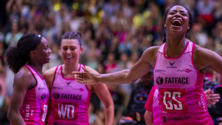 London Pulse players celebrate with the trophy after winning the Netball Super League Grand Final at the O2 Arena, London