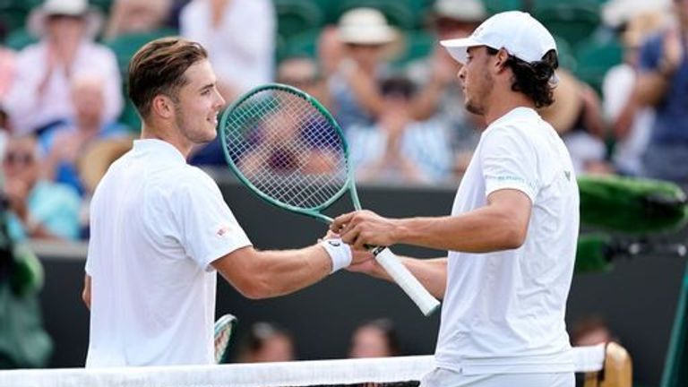 Luciano Darderi (right) celebrates his victory against Arthur Ferry on the fourth day of Wimbledon 2025 at all English 