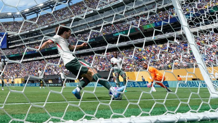 Chelsea's Marc Cucurella clears the ball off the line with Robert Sanchez beaten in the Club World Cup semi-final against Fluminense