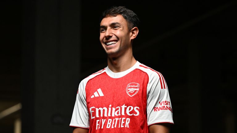 New Arsenal signing Martin Zubimendi poses for a photo at the Emirates Stadium