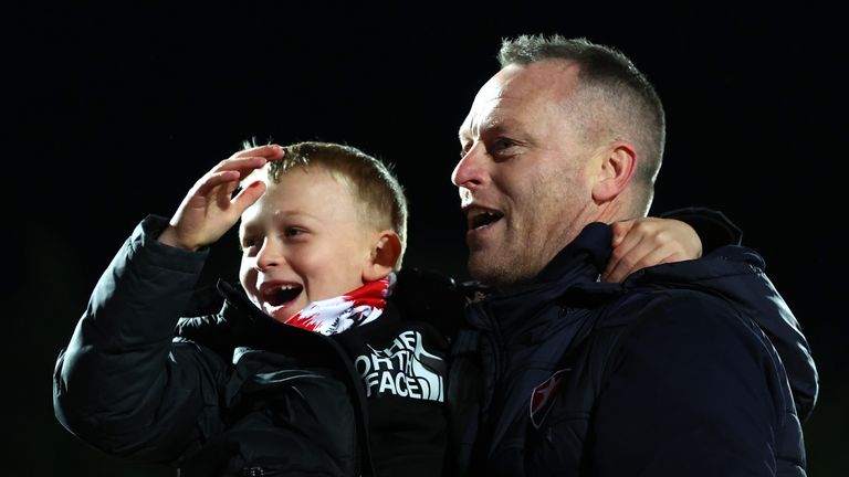 Michael Flynn manager of Cheltenham Town celebrates after the Sky Bet League Two match between Cheltenham Town and Tranmere Rovers in 2024