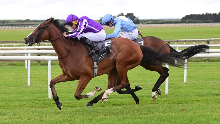 19-7-25 Curragh..Minnie Hauk and Ryan Moore win the Juddmonte Irish Oaks (Group 1) from Wemightakedlongway..Healy Racing Photo