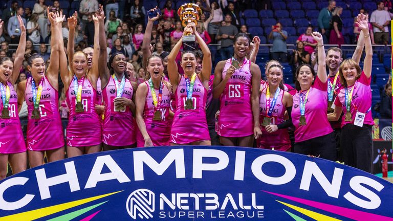 London Pulse players celebrate with the trophy after winning the Netball Super League Grand Final at the O2 Arena, London. 