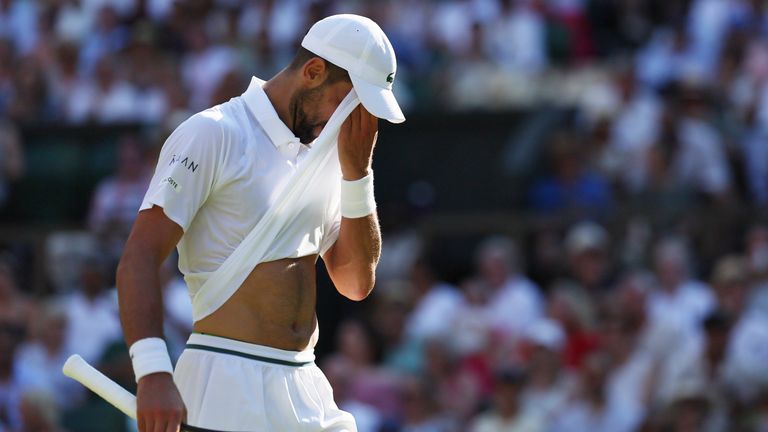Novak Djokovic of Serbia reacts during gentlemen's singles semi-finals match against Jannik Sinner of Italy on day twelfth of the Wimbledon 