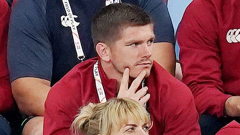 British and Irish Lions' Owen Farrell watches on from the bench during the game against the Waratahs