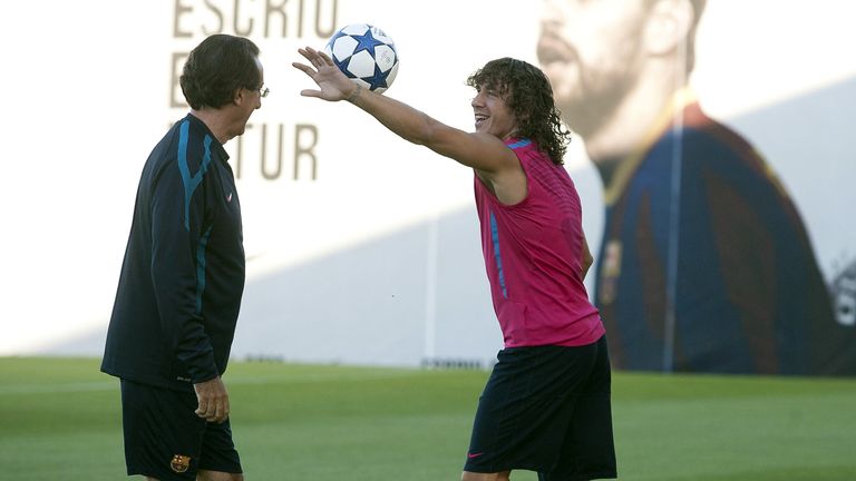 Barcelona's physical trainer Paco Seirul·lo  and Barcelona's captain Carles Puyol attend a training session in Barcelona