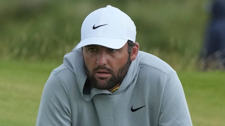 Scottie Scheffler of the United States waits to putt on the 8th green during the second round of the British Open golf championship at the Royal Portrush Golf Club, Northern Ireland, Friday, July 18, 2025. (AP Photo/Jon Super)