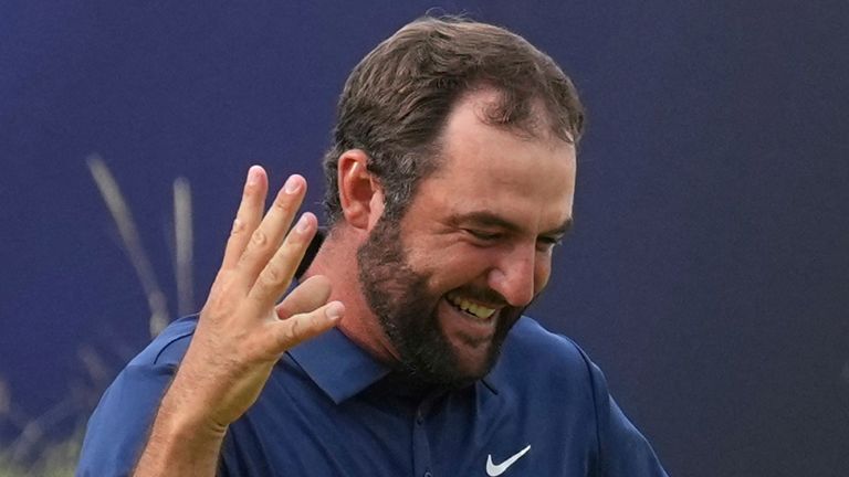 Scottie Scheffler of the United States celebrates after winning the British Open golf championship at the Royal Portrush Golf Club, Northern Ireland, Sunday, July 20, 2025. (AP Photo/Jon Super)