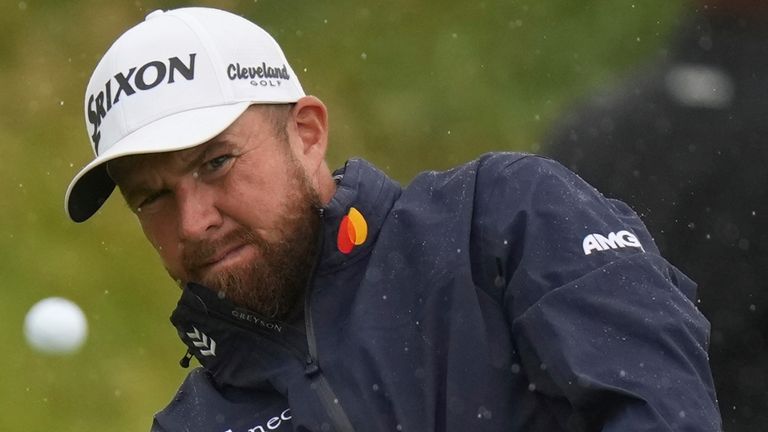 Shane Lowry of Ireland chips onto the 7th green during the first round of the British Open golf championship at the Royal Portrush Golf Club, Northern Ireland, Thursday, July 17, 2025. (AP Photo/Francisco Seco)