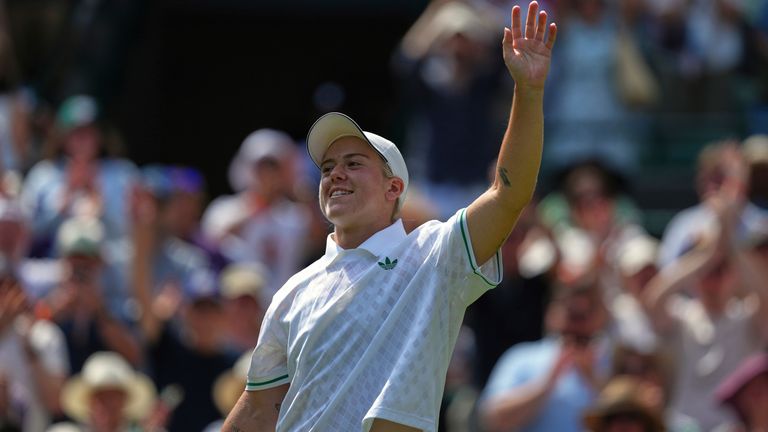 Sonay Kartal of Britain celebrates winning the women's singles third round match against Diane Parry of France at the Wimbledon Tennis Championships in London, Friday, July 4, 2025.(AP Photo/Joanna Chan)