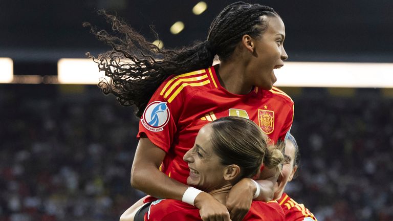 Spain's Esther Gonzalez celebrates scoring against Portugal at Euro 2025 with Vicky Lopez