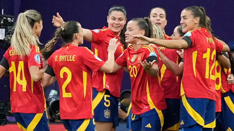 Spain players celebrate after Esther Gonzalez scored the opening goal against Portugal at Euro 2025
