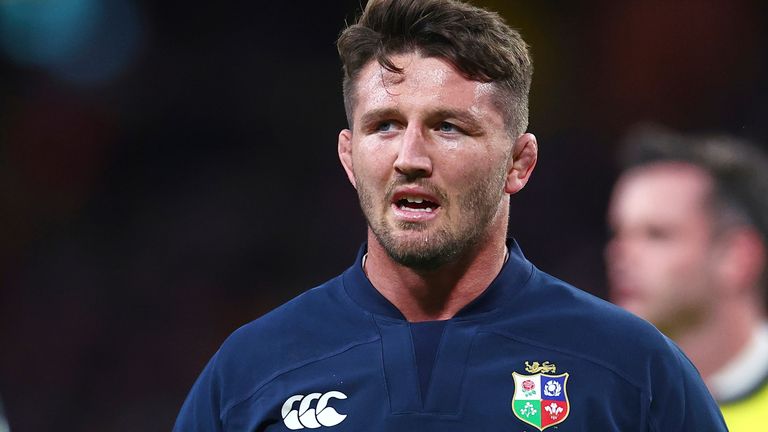 Tom Curry of the British & Irish Lions warms up ahead of their game against the Queensland Reds in Brisbane, Australia, Wednesday, July 2, 2025. (AP Photo/Pat Hoelscher)