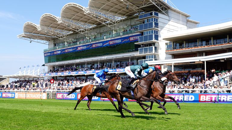 Zgharta and Hollie Doyle in winning action at Newmarket