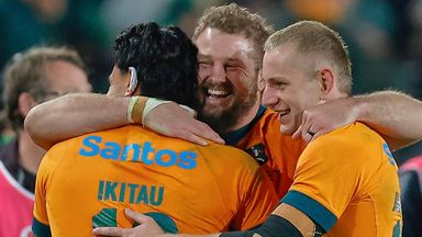 Australia's players celebrate following a historic victory in the Test match at Ellis Park (AP Photo/Frans Lombard)