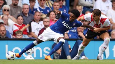 Ipswich Town's Jaden Philogene is challenged by Southampton's Taylor Harwood-Bellis