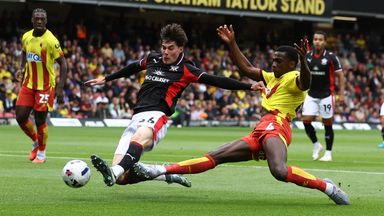 Jay Robinson of Southampton (L) and Kevin Keben of Watford battle for the ball