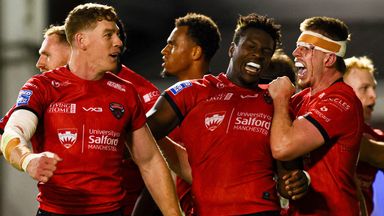 Justin Sangare (second from right) scored twice as Salford pulled off a shock Super League win at Warrington 