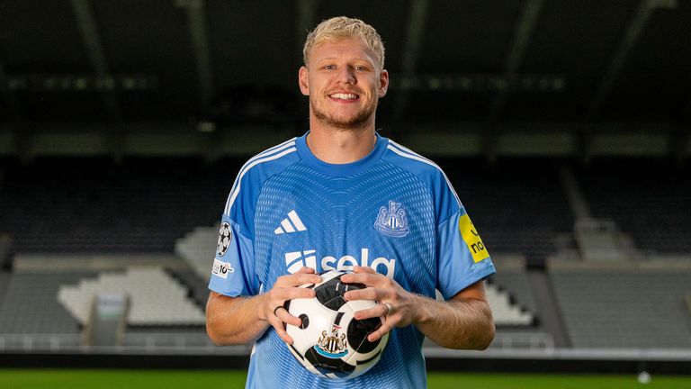 Aaron Ramsdale poses during a photocall after signing a contract to join Newcastle United on loan