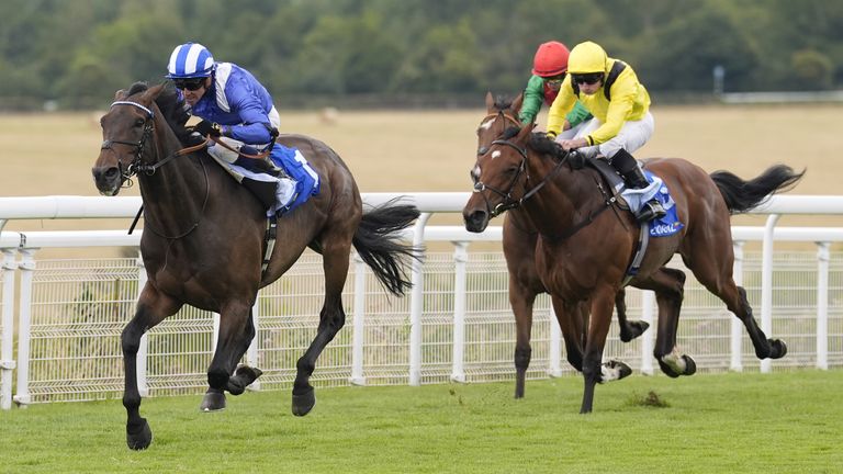 Al Aasy ridden by jockey Jim Crowley, on their way to winning the Glorious Stakes.