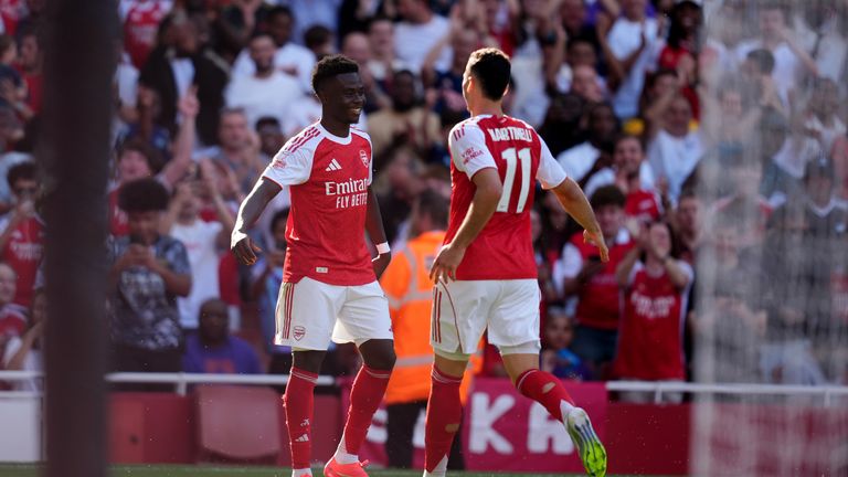 Bukayo Saka celebrates with Gabriel Martinelli for Arsenal's second goal