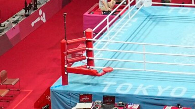 Eliad Mourad, of France refuses to leave the ring after losing a men...s super heavyweight over 91-kg boxing match against Britain's Frazer Clarke at the 2020 Summer Olympics, Sunday, Aug. 1, 2021, in Tokyo, Japan. (AP Photo/Frank Franklin II)
