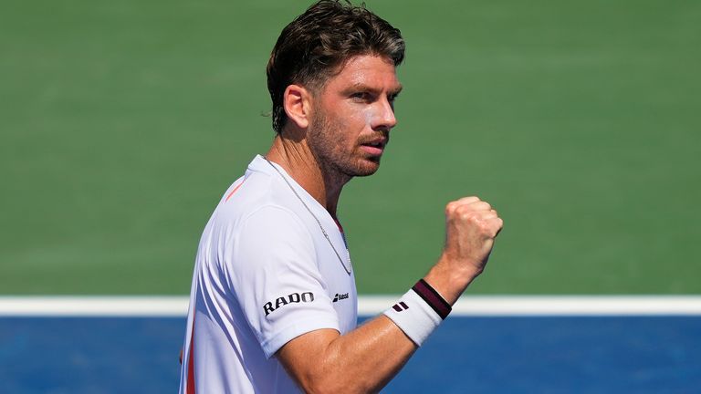 Cameron Norrie, of Great Britain, reacts after scoring a point against Sebastian Korda, of the United States, during the first round of the 