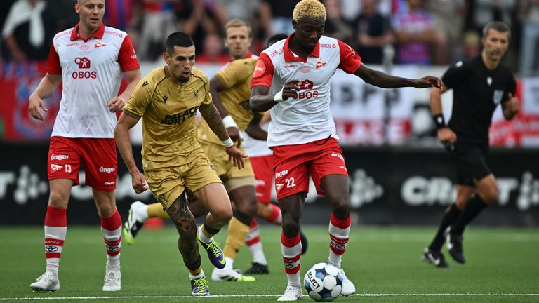 FREDRIKSTAD, NORWAY - AUGUST 28: Daniel Munoz of Crystal Palace and Maxwell Woledz of Fredrikstad FK battle for a ball during the UEFA Confe