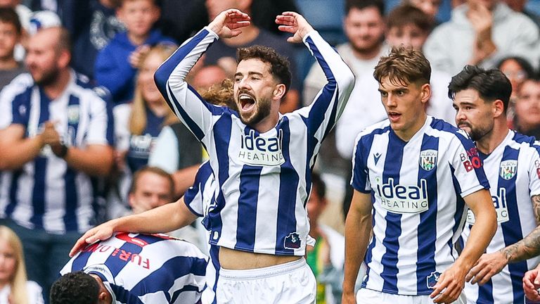 Mikey Johnston celebrates after scoring West Brom's opening goal against Portsmouth