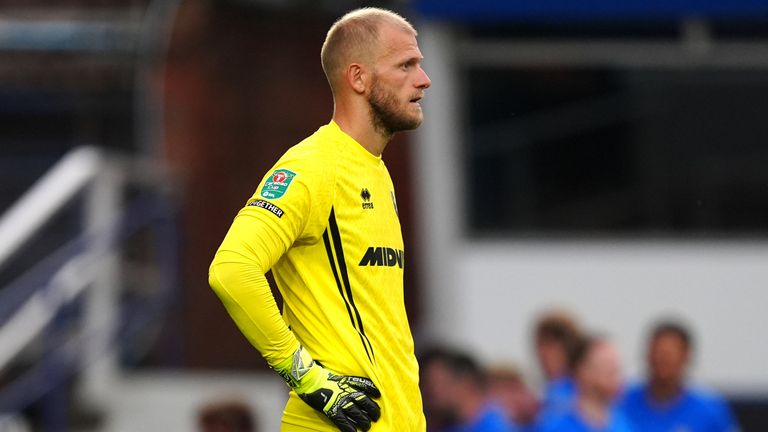 Sheffield United goalkeeper Adam Davies reacts after conceding the opening goal against Birmingham City