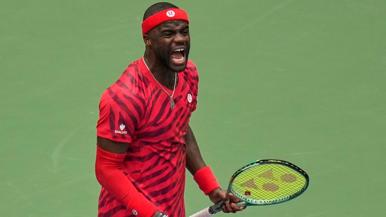Frances Tiafoe, of the United States, reacts after defeating Yoshihito Nishioka, of Japan, during the first round of the US Open tennis cham