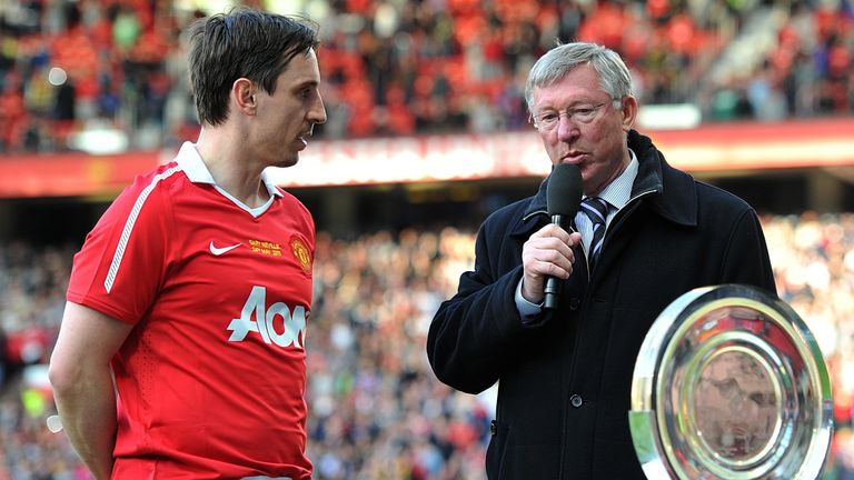 Gary Neville pictured with his former manager Sir Alex Ferguson