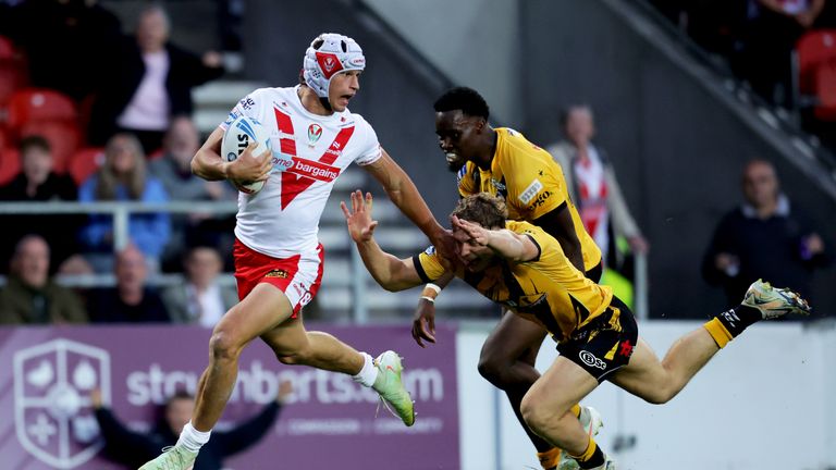 Harry Robertson breaks away to score for St Helens