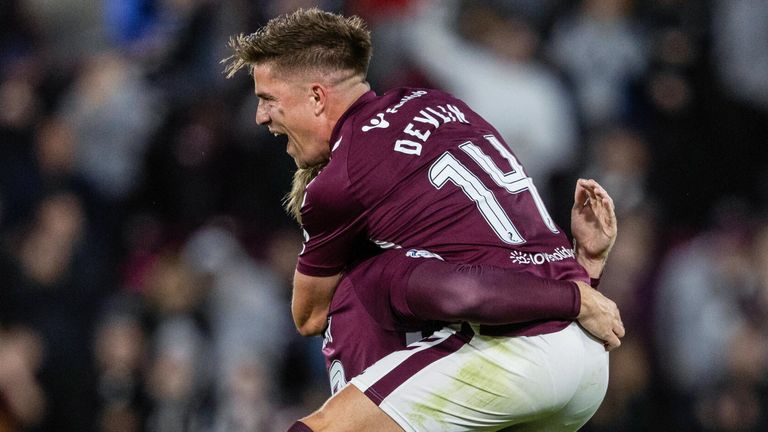 Hearts' Stuart Findlay (L) celebrates with Cammy Devlin 